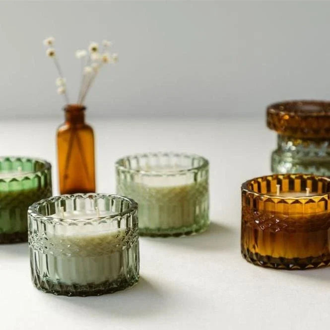 four-different-colors-of-vintage-inspired-glass-candle-vessles-made-with-soy-wax